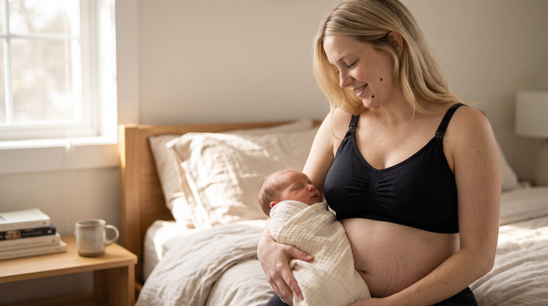 A mother cradling her newborn in the first days after birth