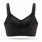 Black bra with straps on a white background
