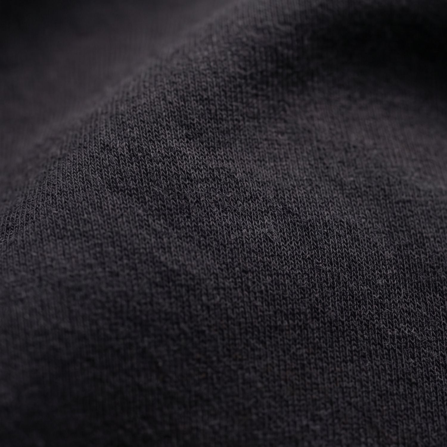 Close-up of dark gray fabric texture